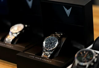 Luxury watch collection in premium display box representing haute horology investment portfolio