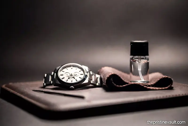 Comprehensive guide on how to remove scratches from a luxury watch bezel using professional tools.