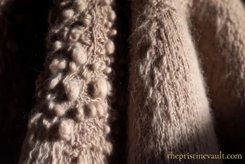 Extreme close-up macro comparison of cashmere fabric showing severe pilling and fuzzy bobbles on left side versus smooth pristine cashmere texture on right side illustrating the difference between damaged and well maintained luxury knitwear